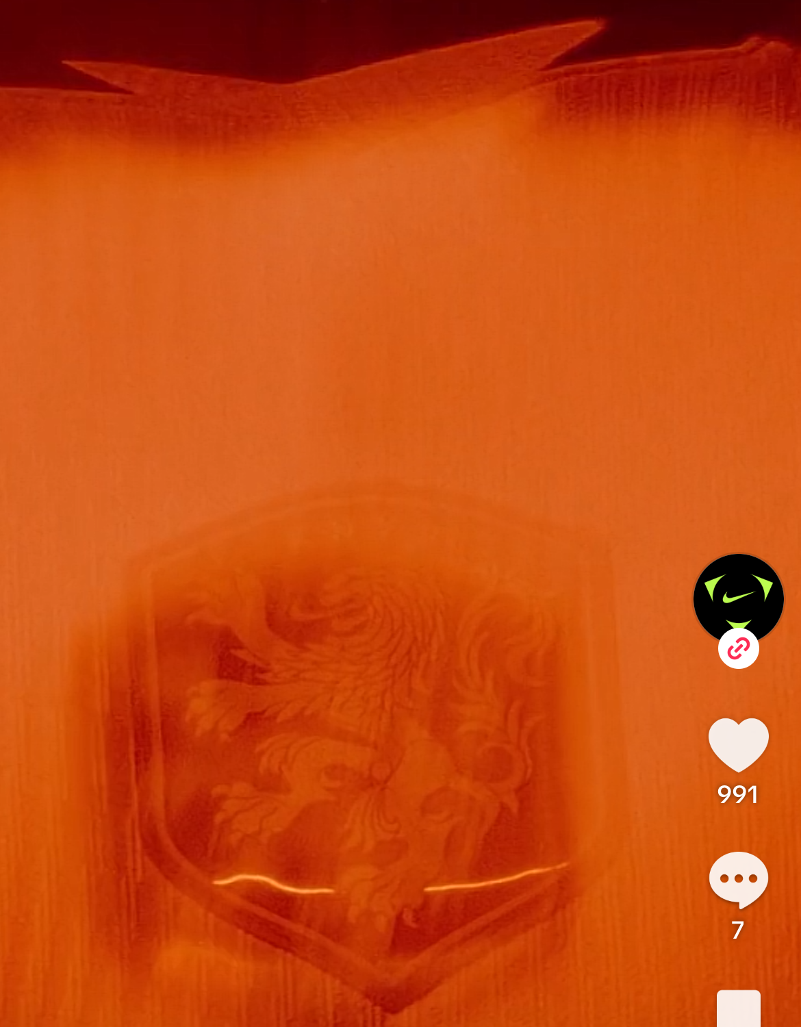 Nike Football TikTok ad with Shop Now button, 991 likes